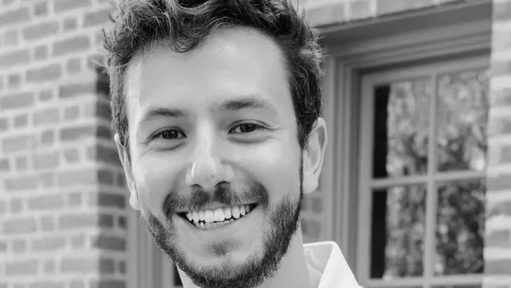 black and white headshot of Jacob Nebel smiling
