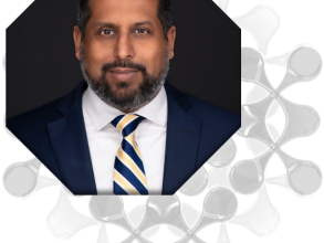 profile image of vilas dhar with the grey graphics behind