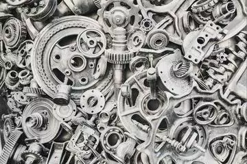 A black and white image of multiple overlapping cogs and gears