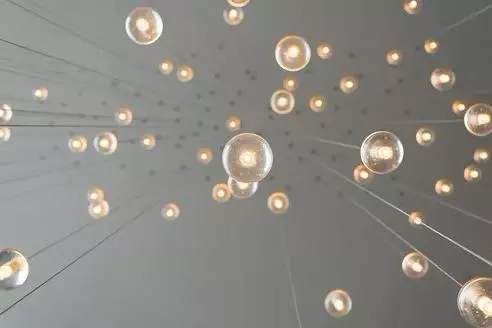 Hanging lightbulbs viewed from below